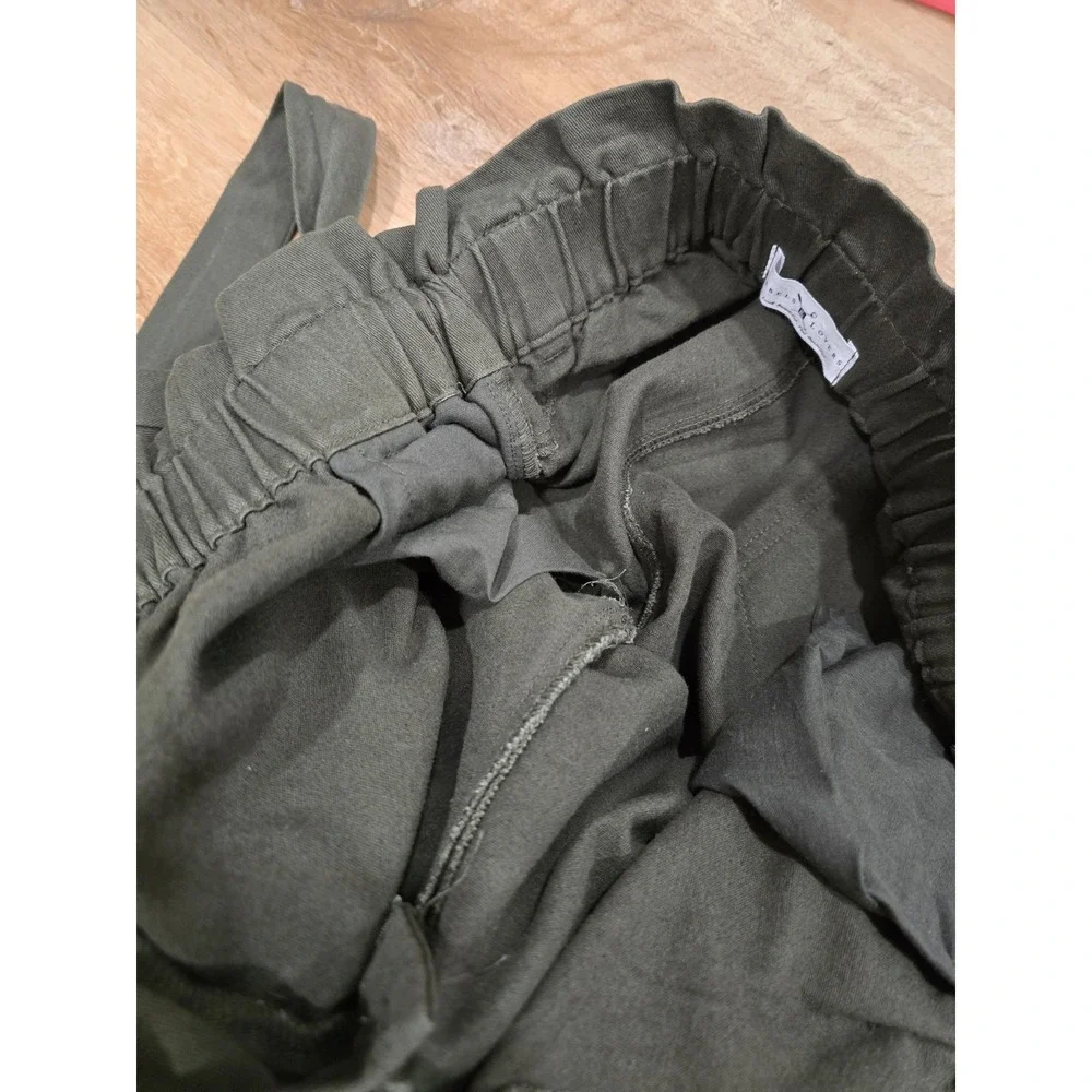Rebels & Lovers casual pants featuring a flattering paperbag high-rise waist....